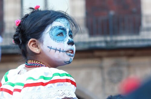 A child with a death mask