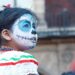 A child with a death mask