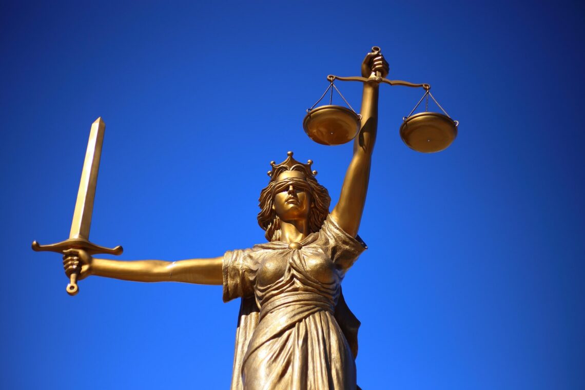 A statue of lady justice blindfolded.